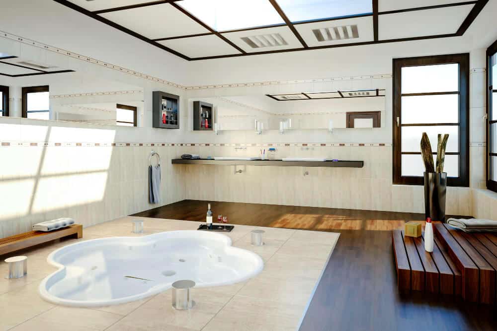 Plafond d'une grande salle de bain montrant une bouche de VMC au-dessus de la douche et une autre au-dessus des WC.